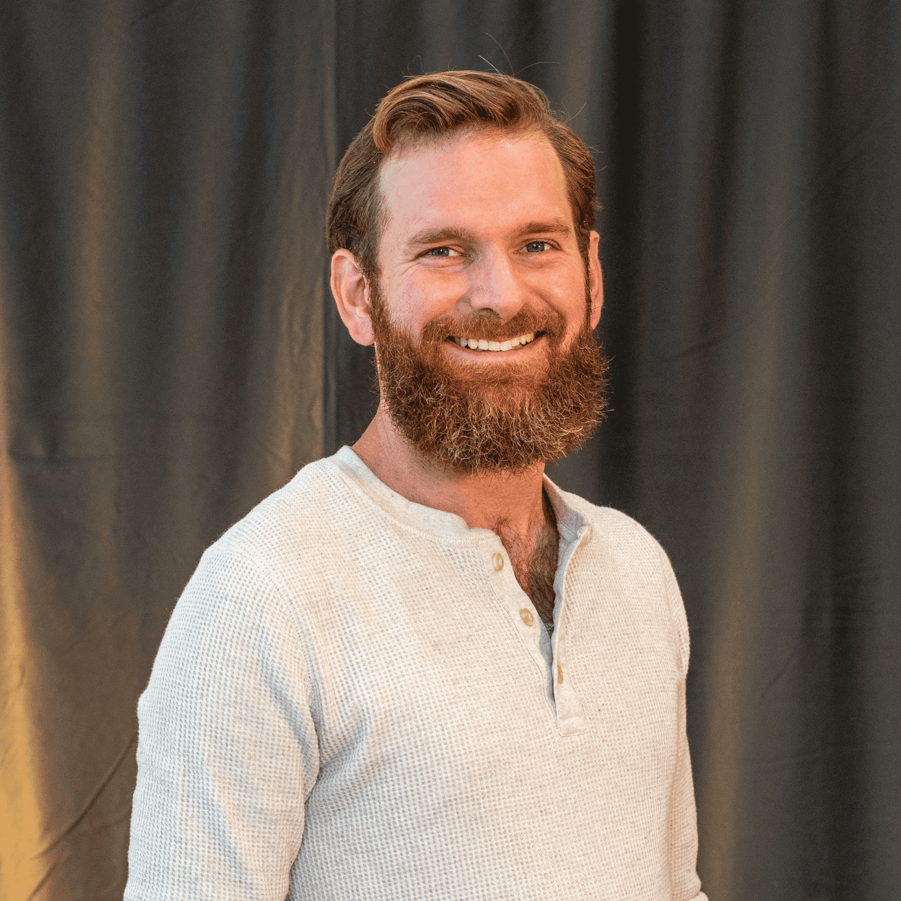 Portrait of Ryan O’Connor, a professional stylist at Salon L Manayunk, showcasing their expertise and style.